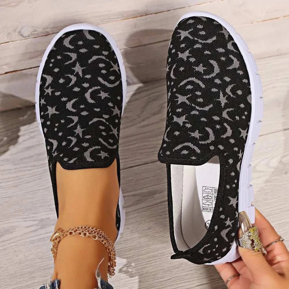 Star & Moon pattern flat loafers in black with white sole, elastomer and polyester material.