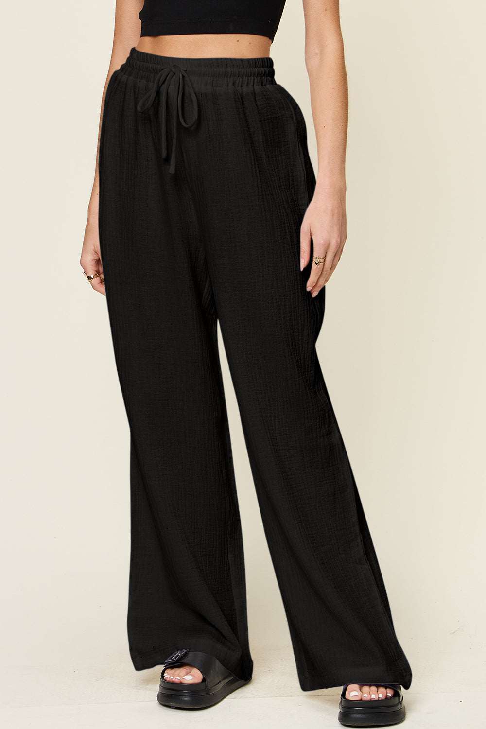 Double Take Full Size Texture Drawstring Wide Leg Pants in black, 100% cotton, featuring a drawstring waist.