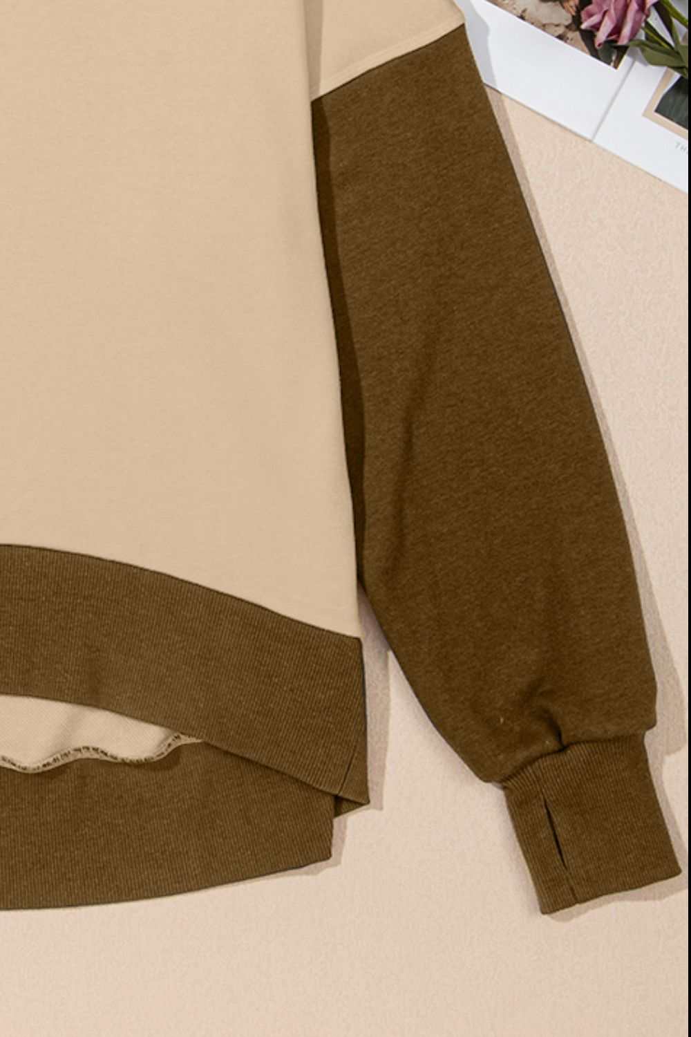 Contrast round neck long sleeve sweatshirt with brown sleeves and beige body, polyester and cotton blend.