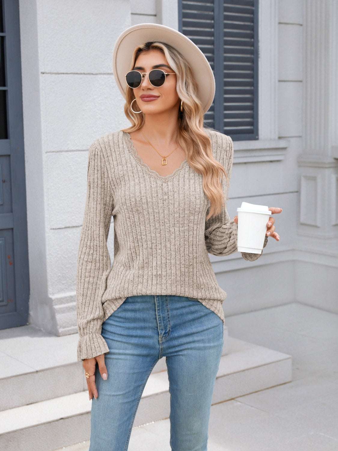 V-Neck Long Sleeve T-Shirt with Lace Detail and Ruffled Design.
