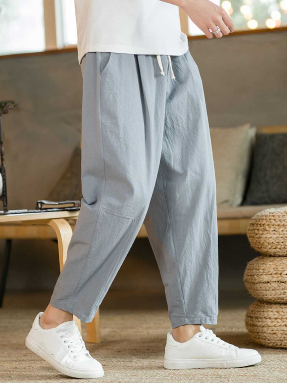 Plus size drawstring pants with pockets, basic style, cotton-flax blend.