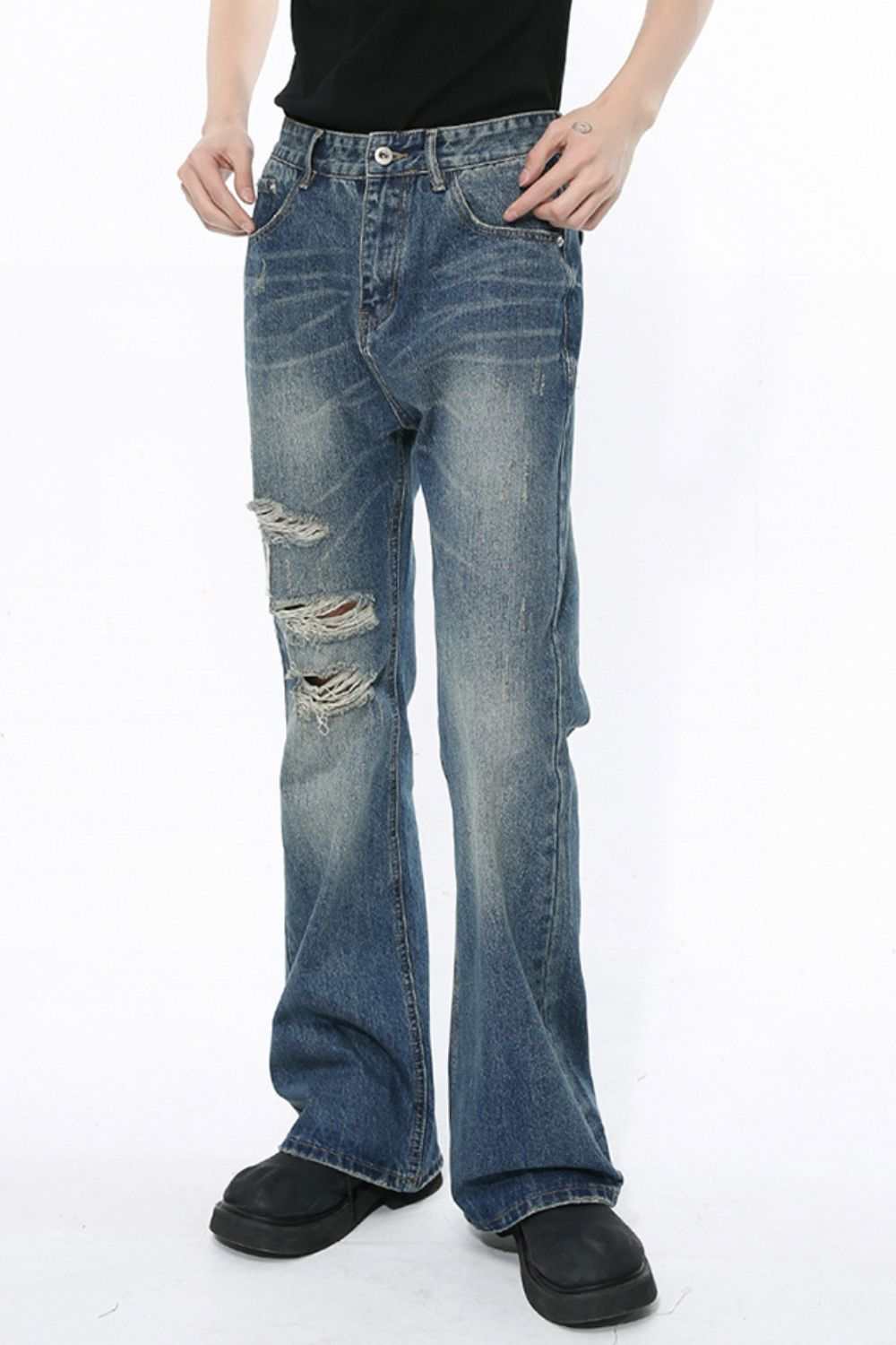 Men's distressed bootcut jeans with ripped design and no stretch.