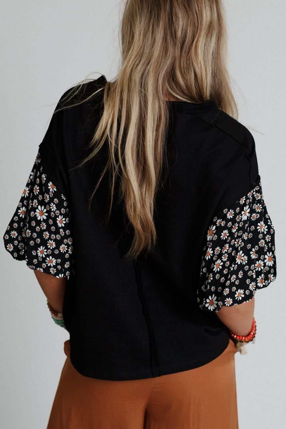 Contrast floral puff sleeve oversized top with basic style, opaque finish, and slightly stretchy material.