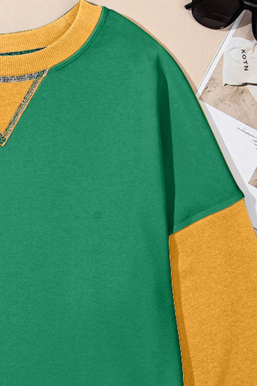 Contrast round neck long sleeve sweatshirt in green and yellow.