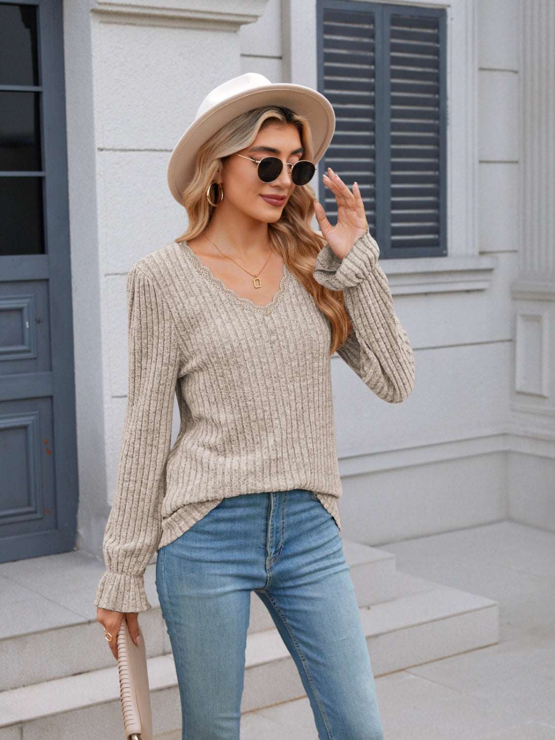 Lace detail V-neck long sleeve T-shirt with ruffled design.