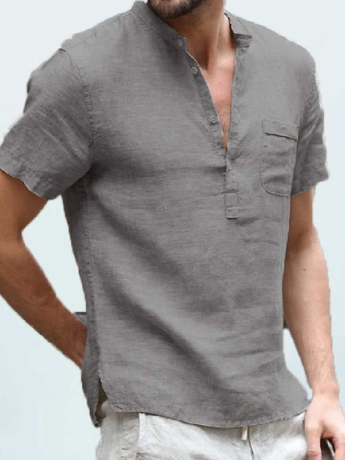 Men's full size half button short sleeve polo in gray, polyester and flax blend.
