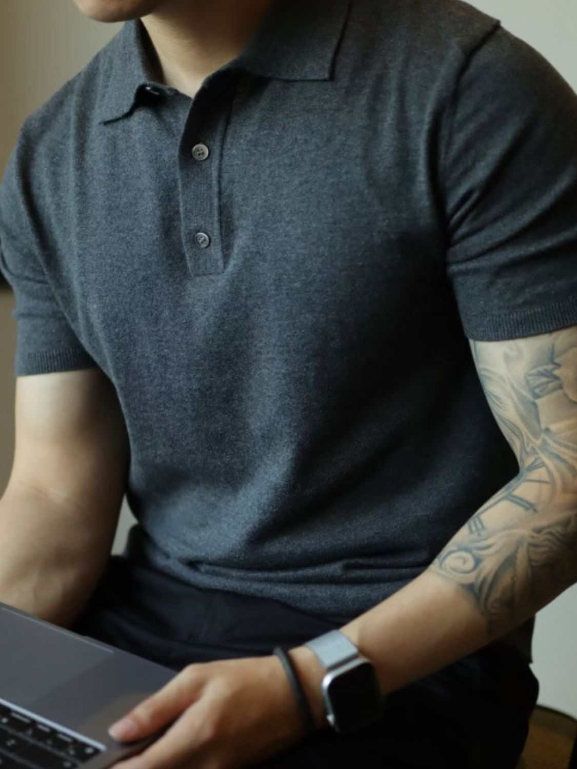 Men's plus size button detail short sleeve polo in dark gray, featuring a basic style and slightly stretchy fabric for comfort.