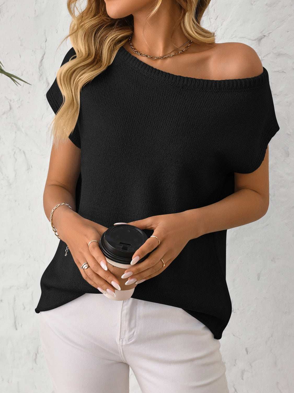 Mandy Boat Neck Short Sleeve Knit Top with moderate stretch in black.
