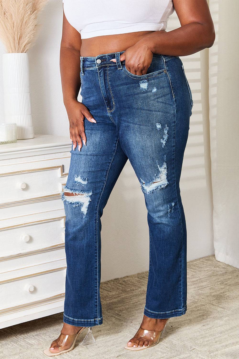 Judy Blue Full Size Mid Rise Hand Sand & Destroy Bootcut Jeans on model showing distressed details and flattering fit.