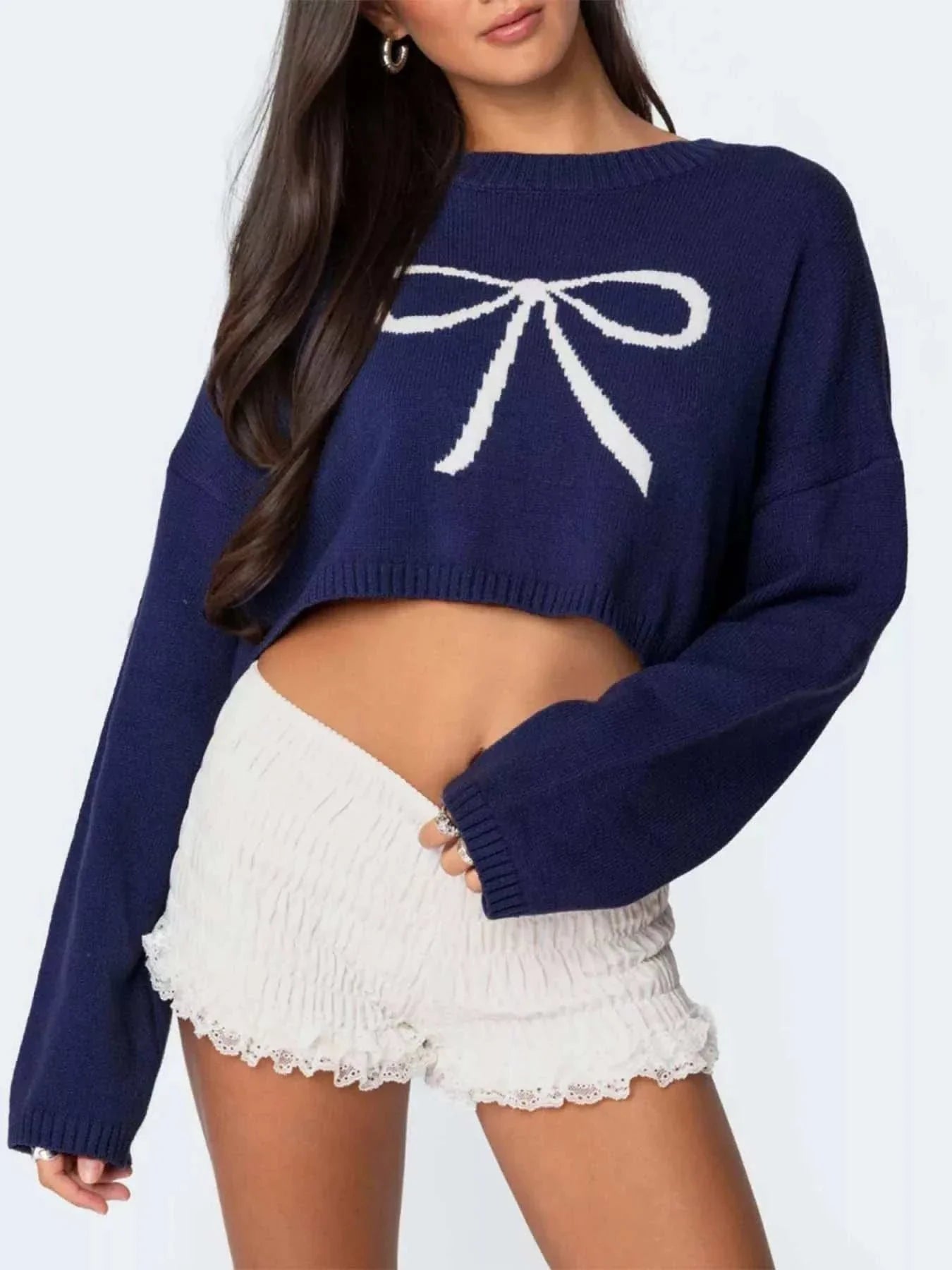 Navy blue bow round neck cropped sweater with long sleeves and slight stretch