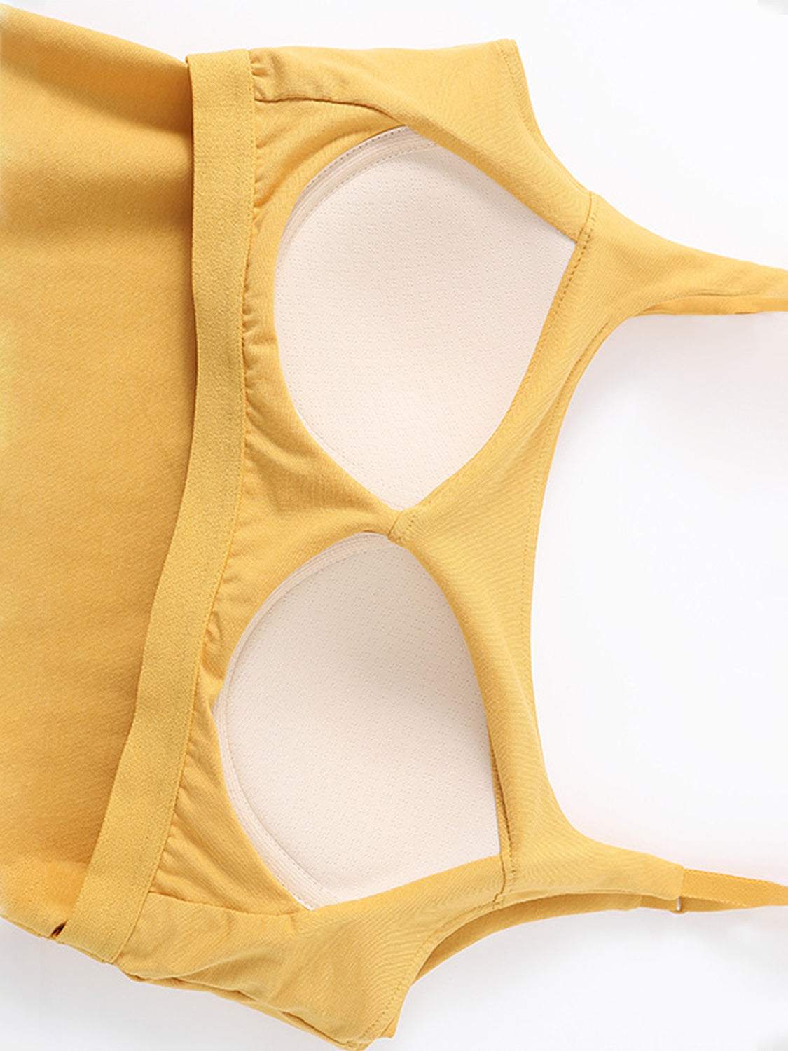 Scoop neck cropped cami with chest pads, highly stretchy fabric in yellow.