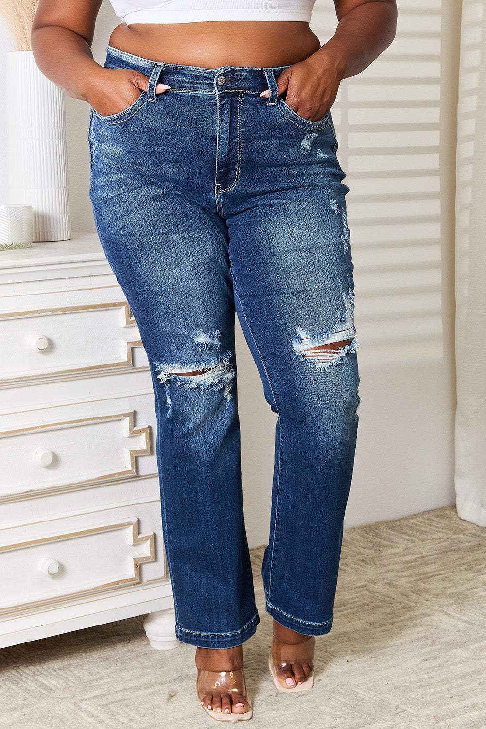 Judy Blue Full Size Mid Rise Bootcut Jeans with distressed details.