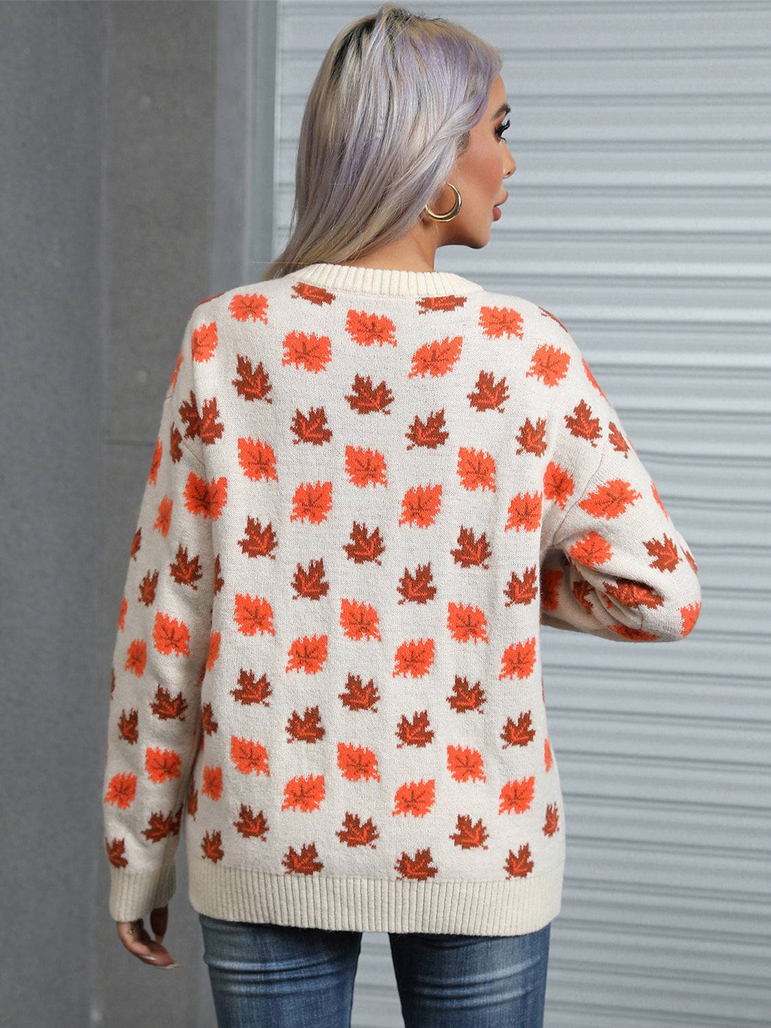 Angel Wings Maple Leaf round neck long sleeve sweater with orange and brown leaf pattern.