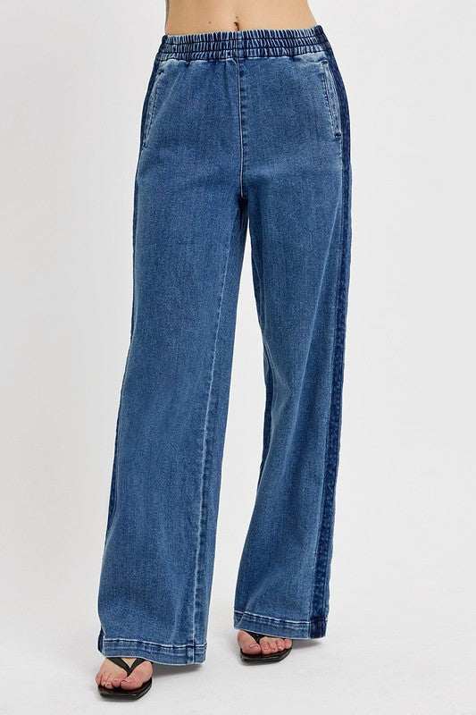 RISEN Full Size Elastic Waist Wide Leg Jeans Plus Size with pockets and slightly stretchy fabric.