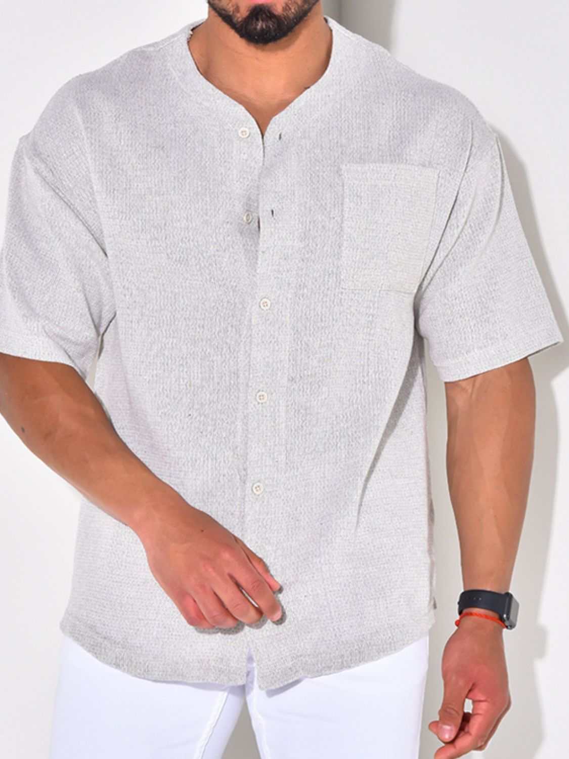 Men's plus size button down shirt with chest pocket in light fabric.