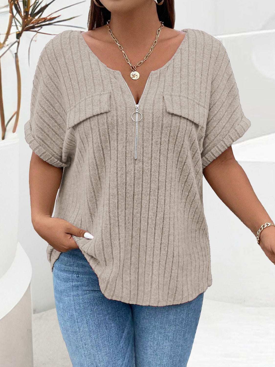 Plus size half zip short sleeve T-shirt, ribbed design, slightly stretchy polyester.