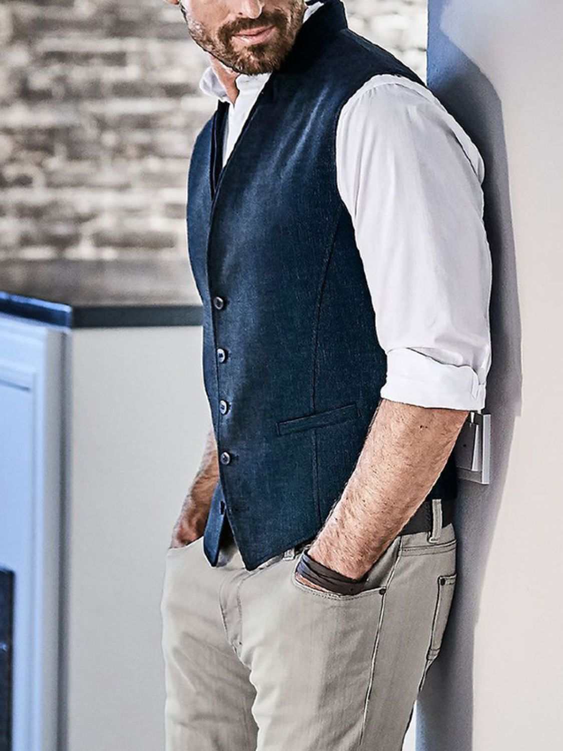 Men's full-size button-down vest, basic style, slightly stretchy, polyester-cotton blend.