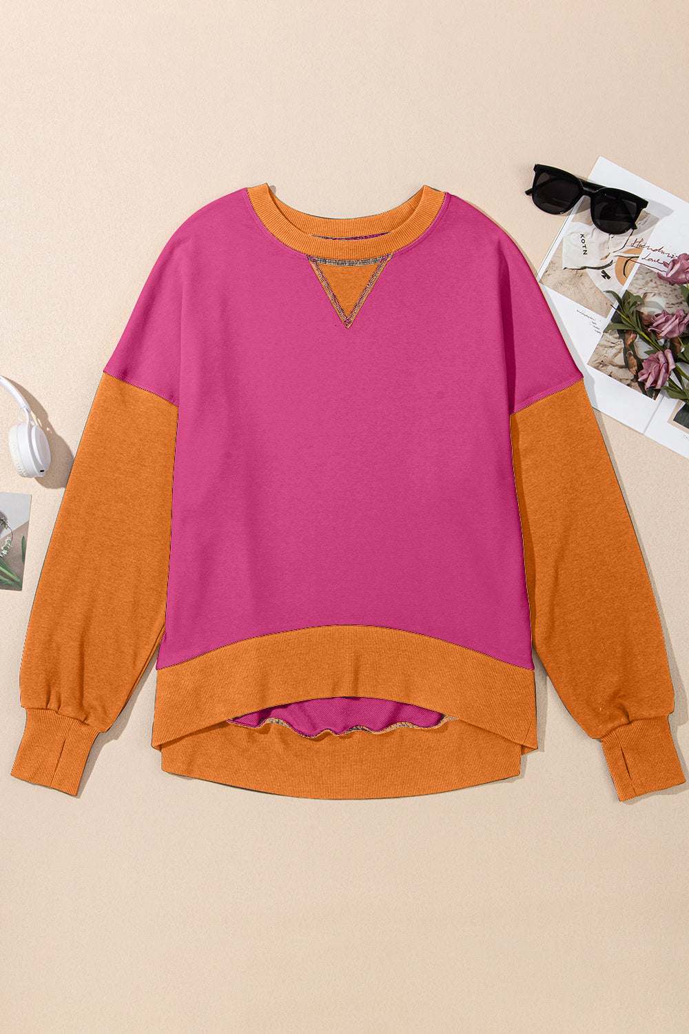 Contrast round neck long sleeve sweatshirt in pink and orange, polyester and cotton blend.