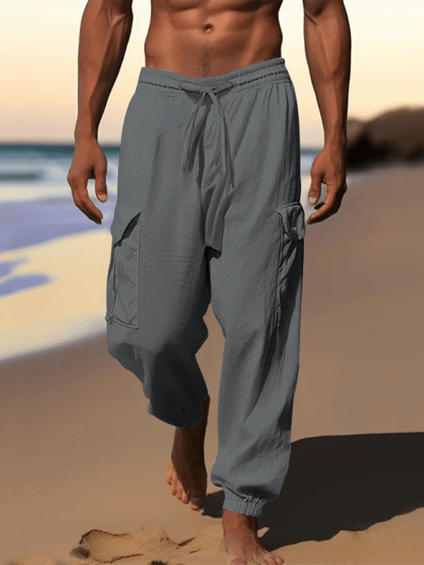 Casual grey cuffed drawstring trousers with multi-pocket design for spring-summer.